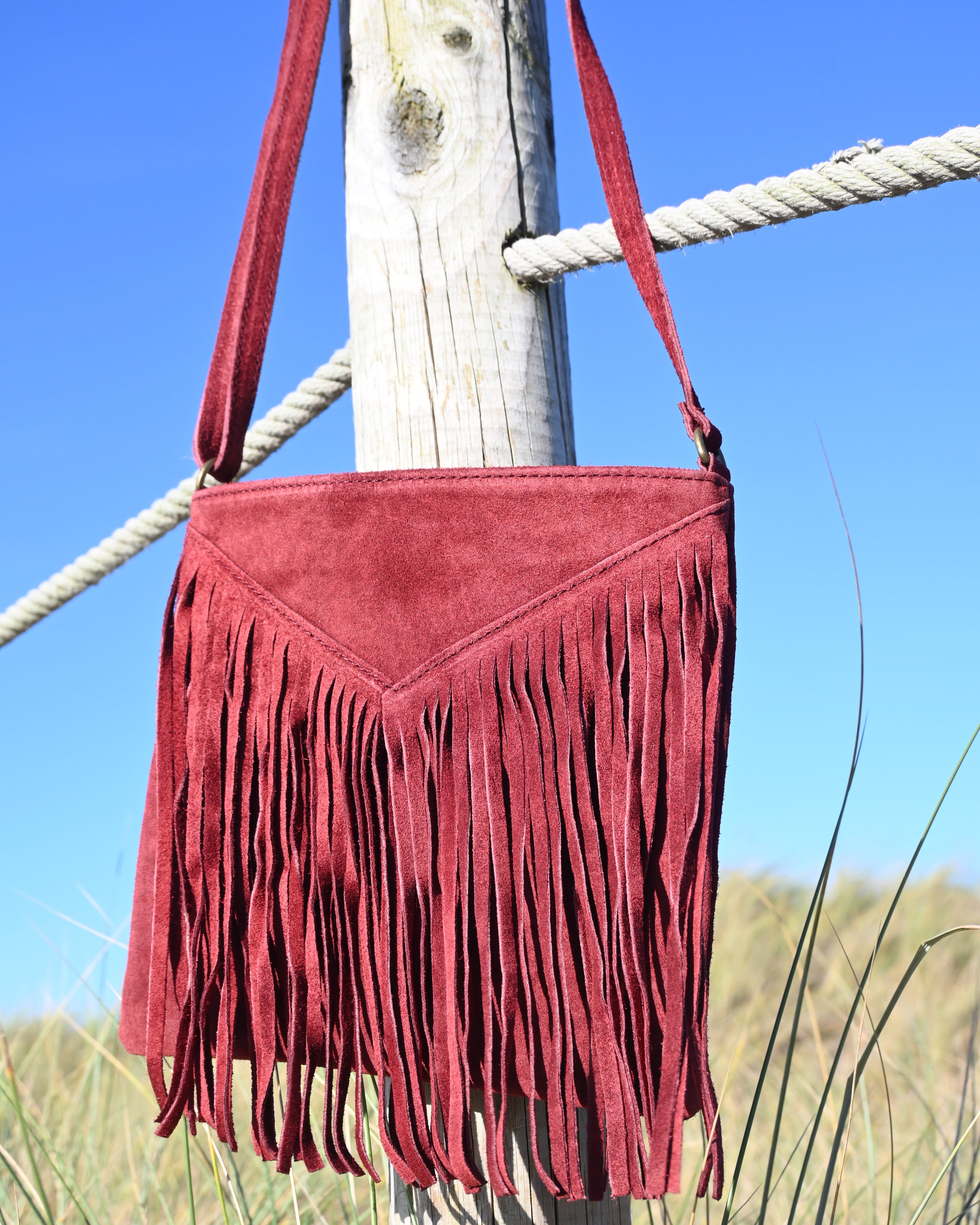 Bolso flecos vino