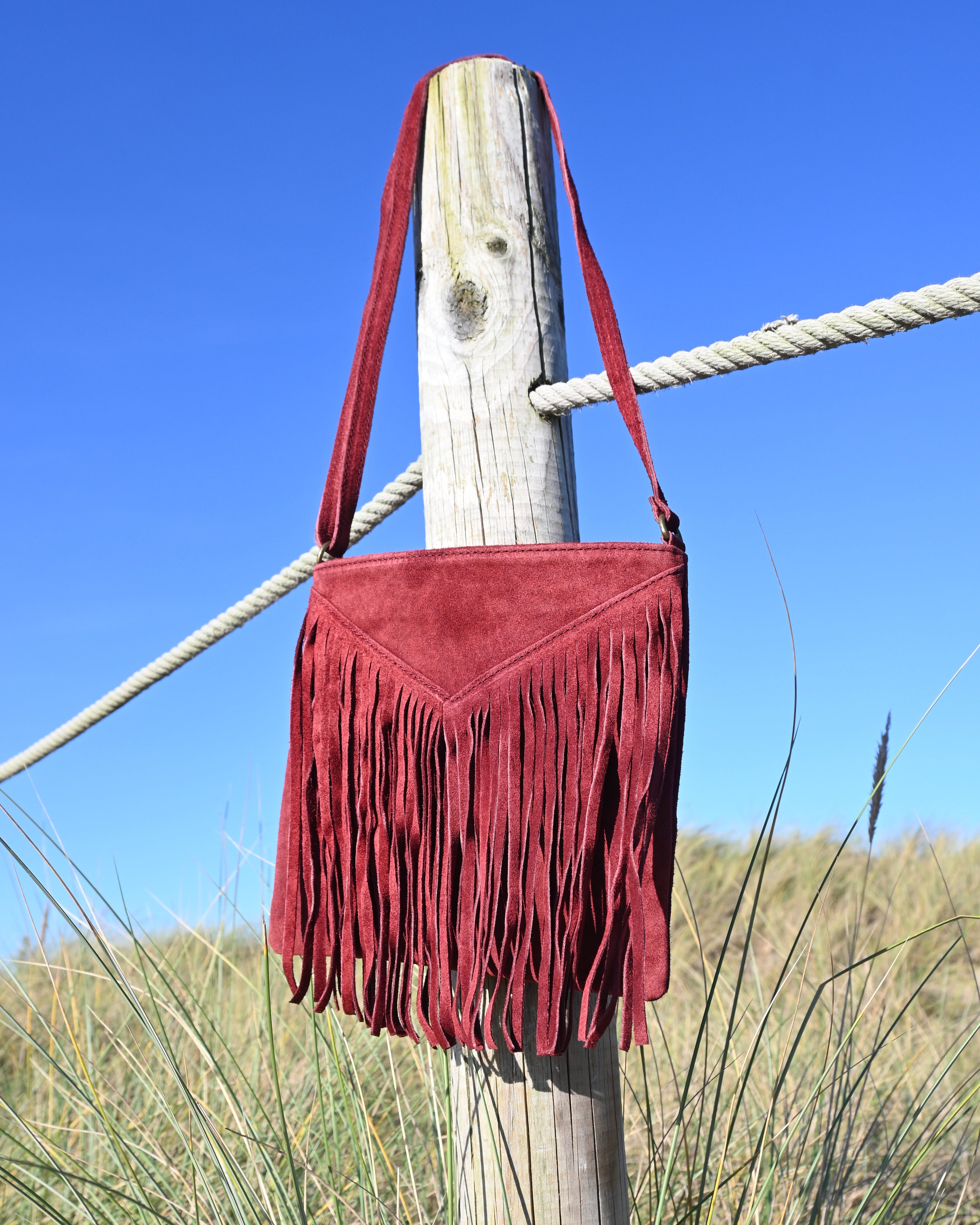 Bolso flecos vino